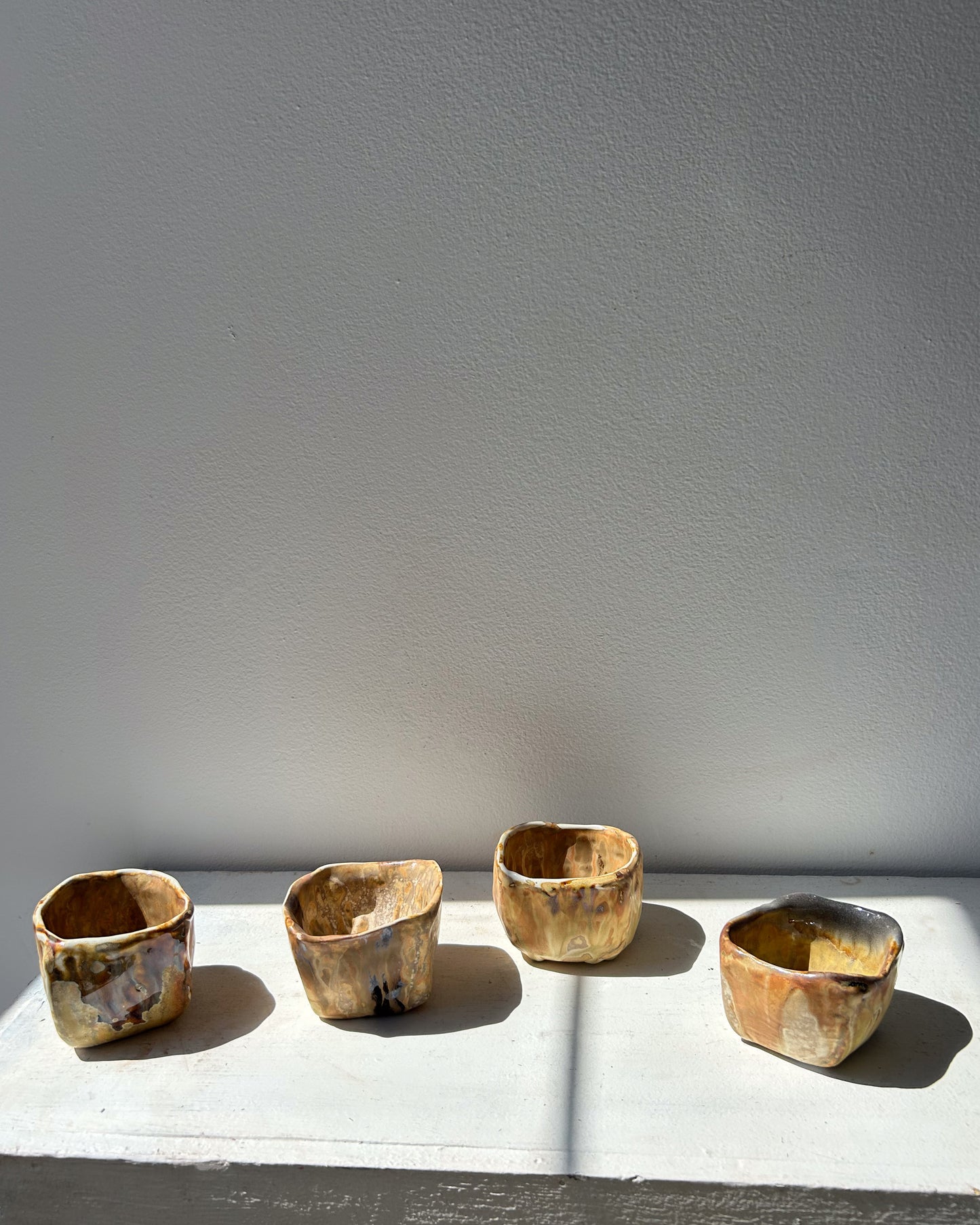 Soda-Fired Pinched Cups, Oranges