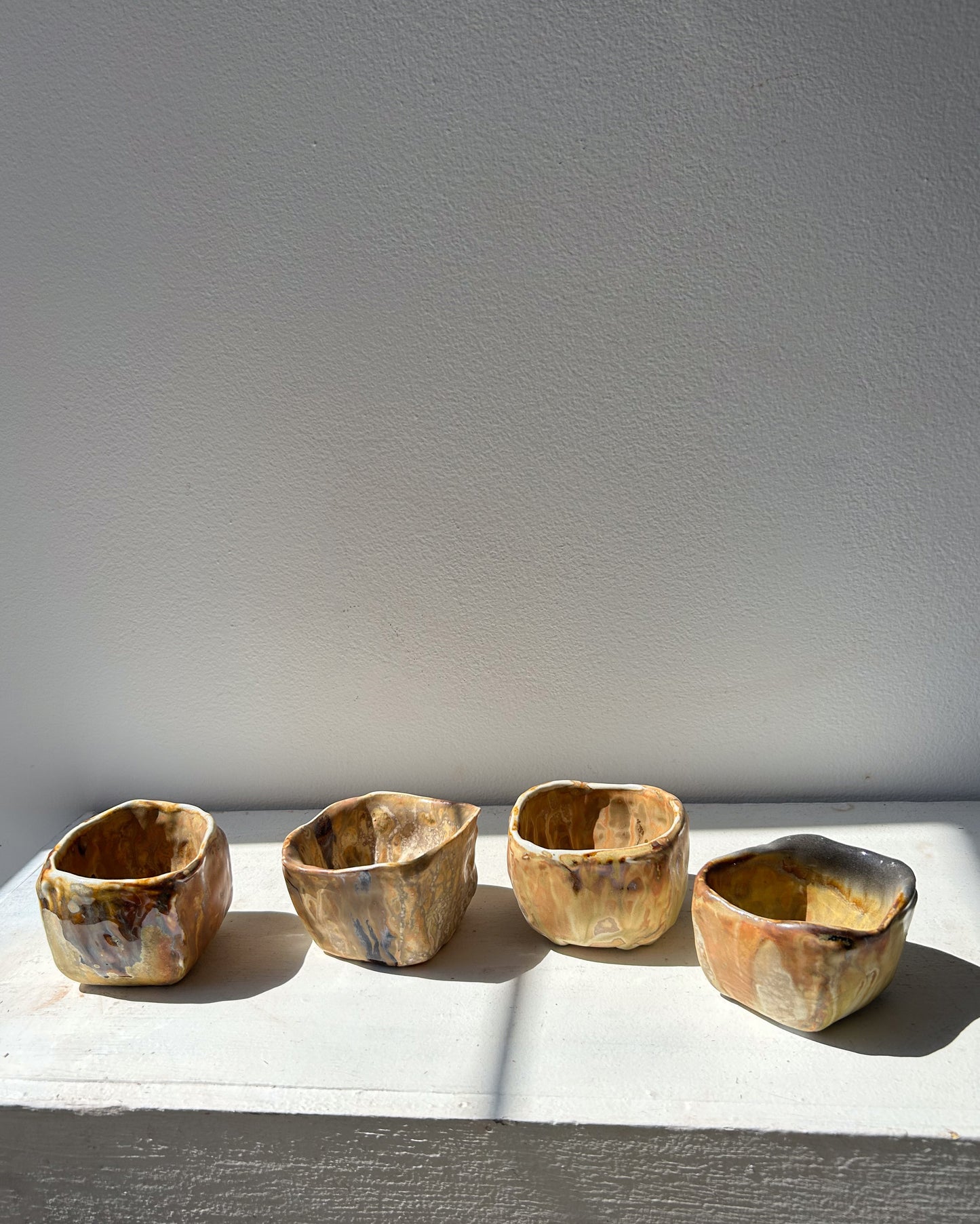 Soda-Fired Pinched Cups, Oranges